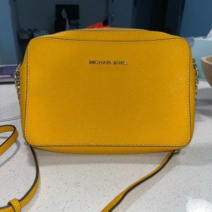 Mustard yellow Michael Kors crossbody purse